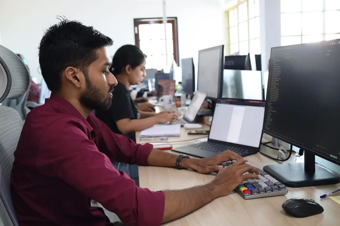 Veyrion team collaborating across robotics, software, AI, and industrial engineering